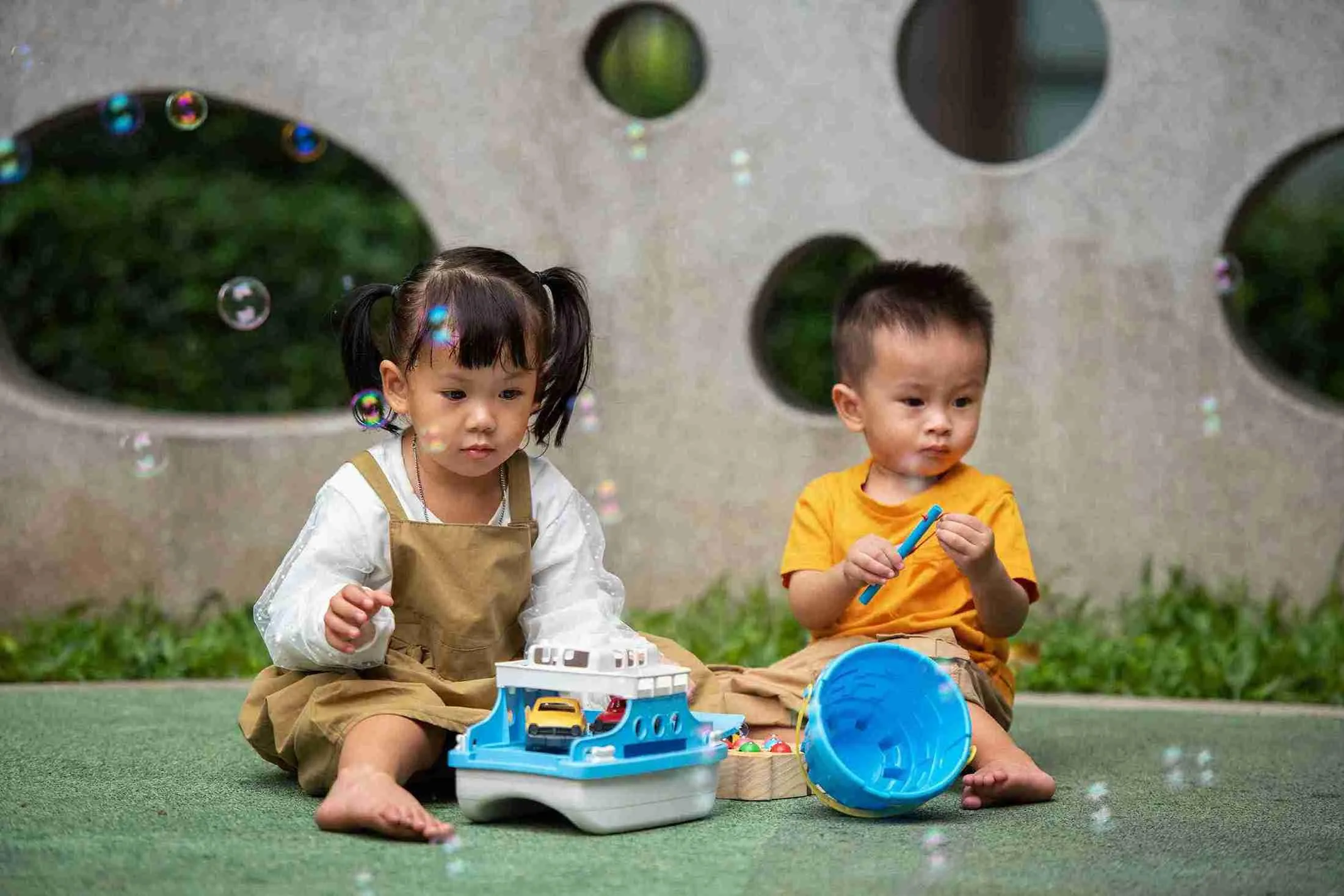 front-view-kids-playing-together-outdoors_11zon