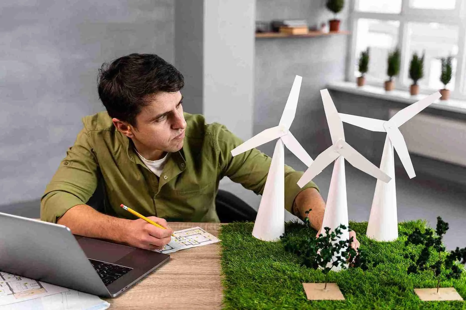 high-angle-man-working-eco-friendly-wind-power-project_11zon
