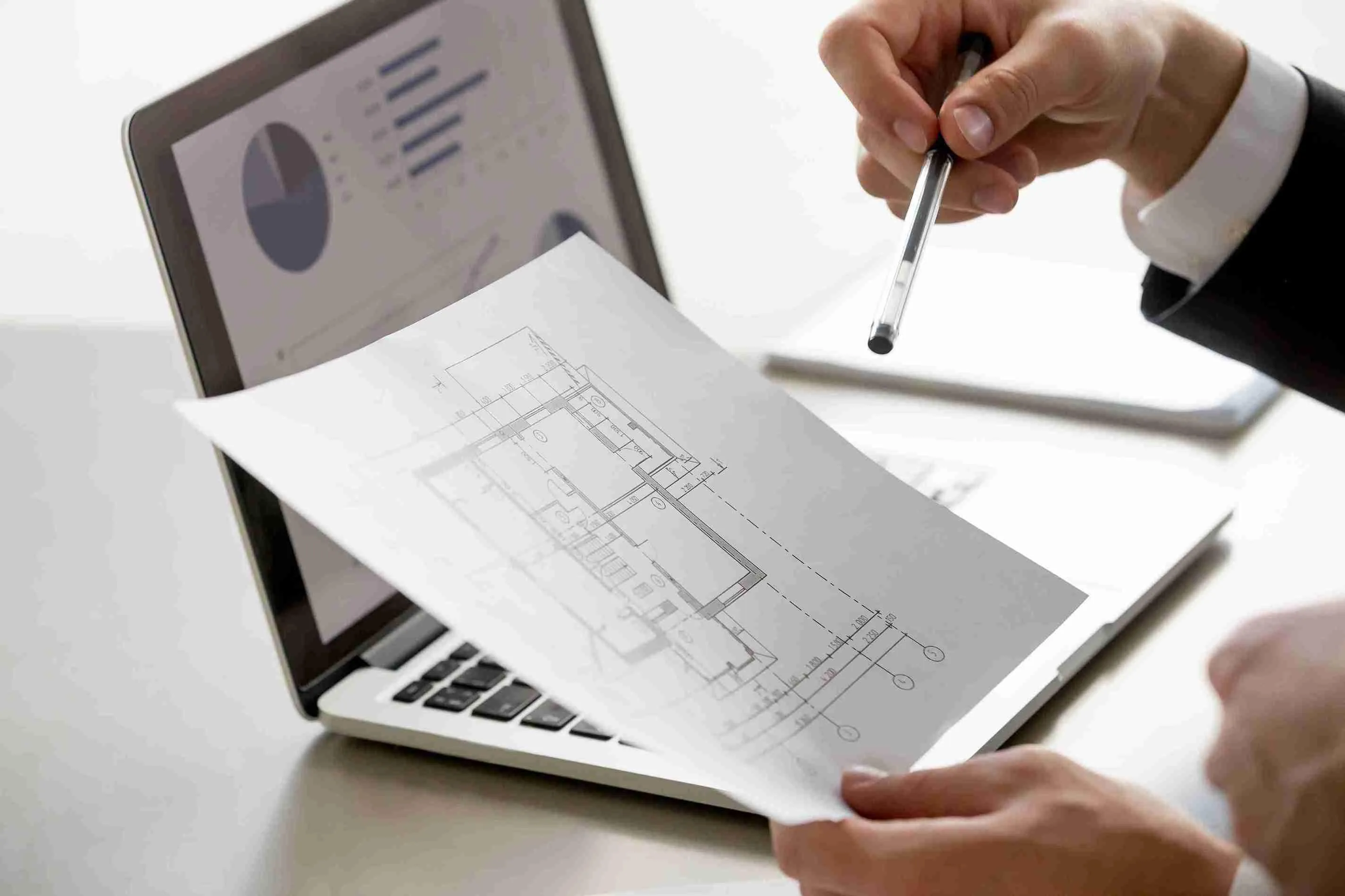 male-hand-holding-project-plan-statistics-screen-close-up_11zon
