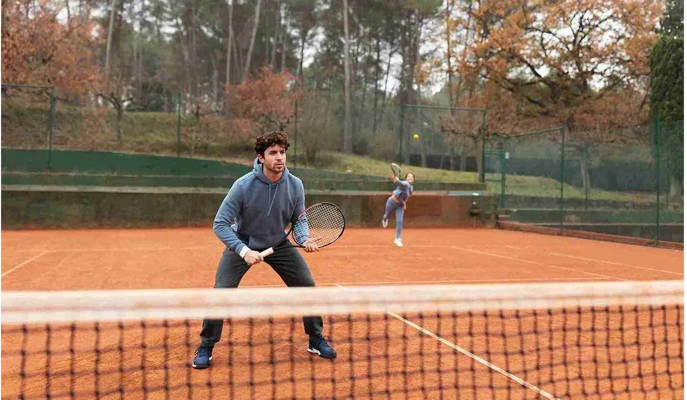 person-playing-tennis-game-winter-time-(1)_11zon