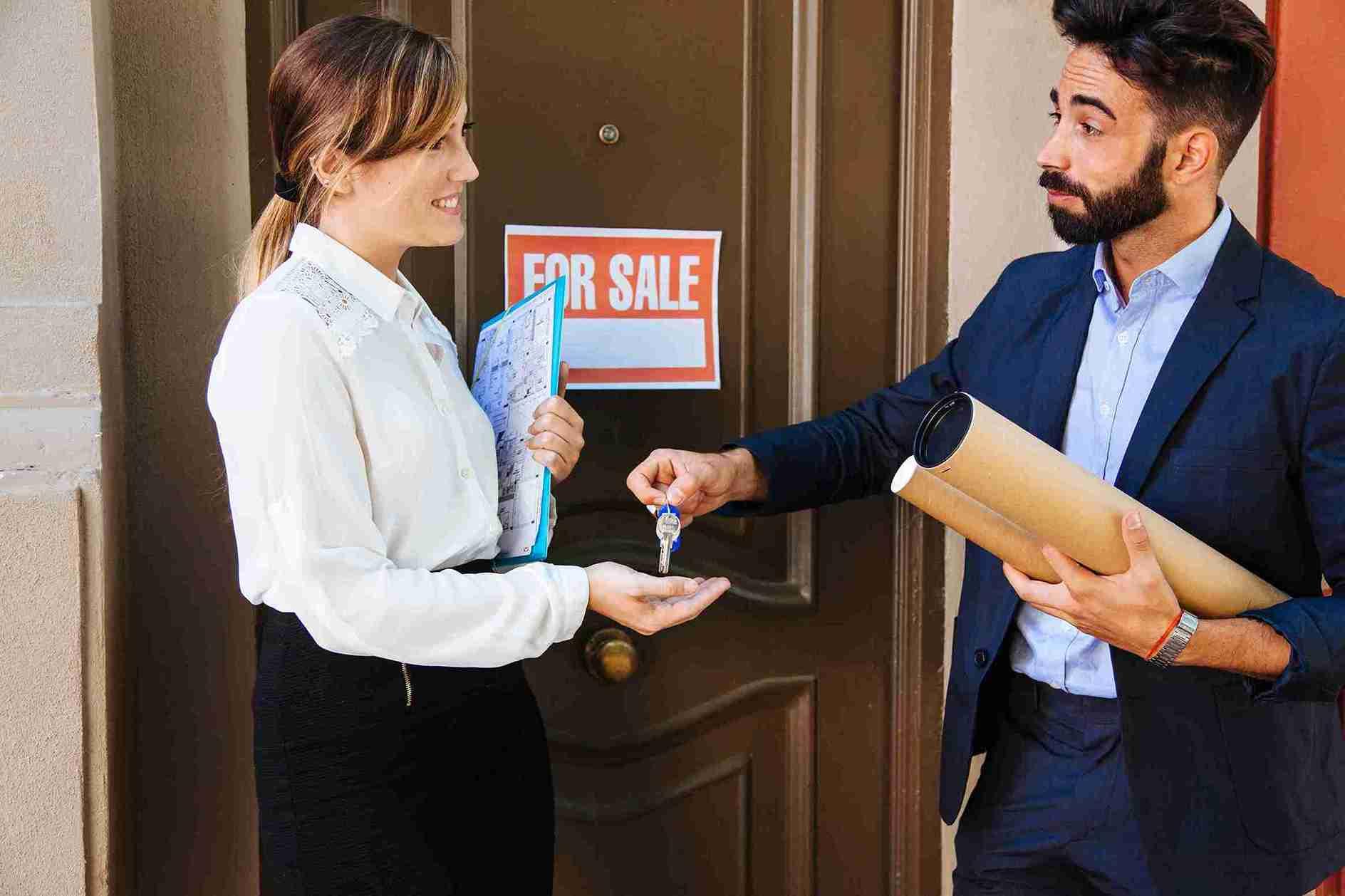 real-estate-agent-giving-key-business-woman_11zon